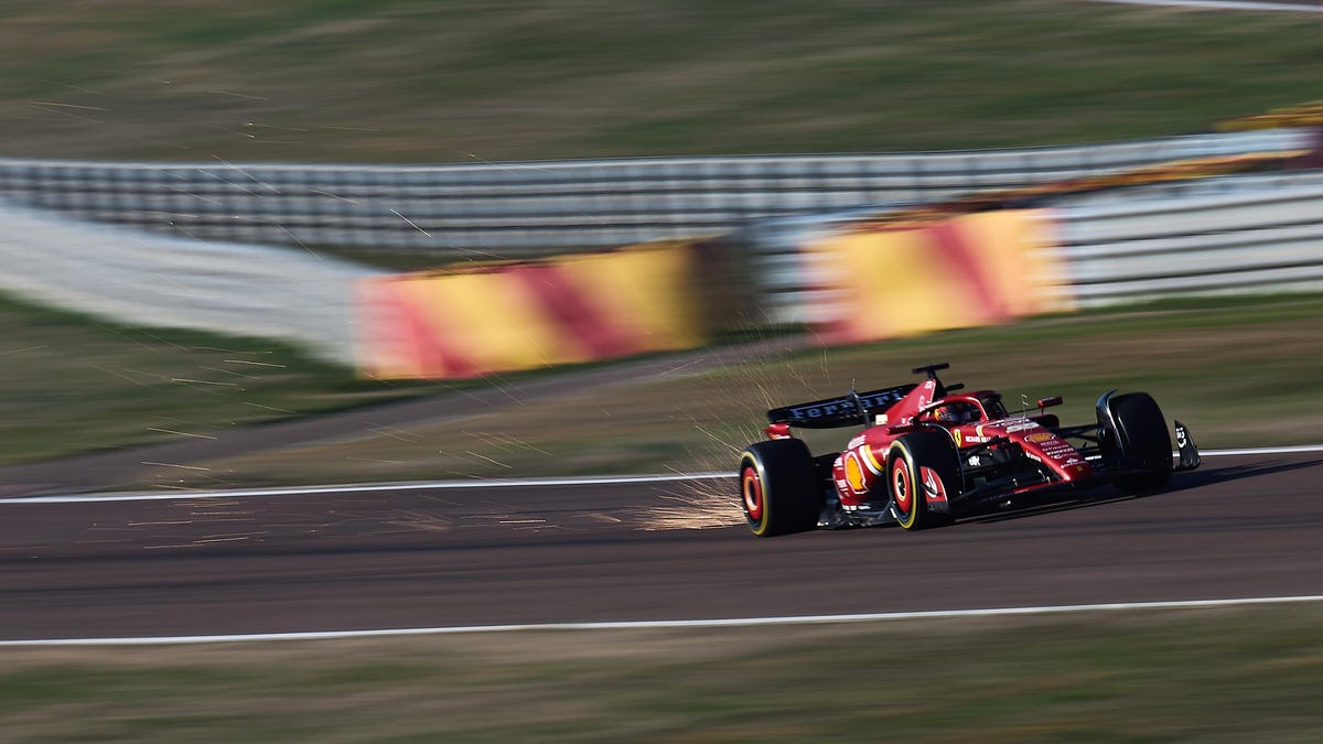 Ferarri's 2024 car racing on a track