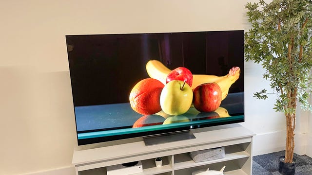 The 2023 LG G3 OLED TV sitting on a light gray TV console.