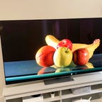 The 2023 LG G3 OLED TV sitting on a light gray TV console.