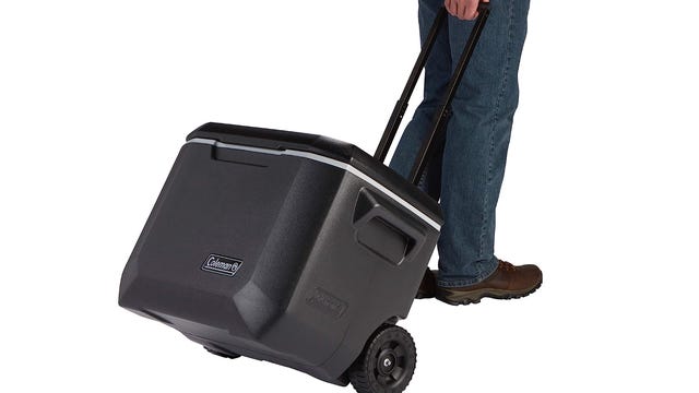 Person pulling coleman cooler